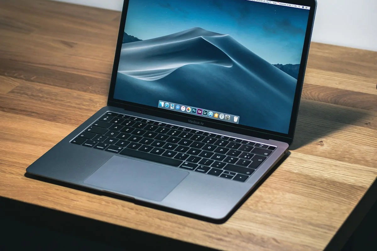 Laptop on a wooden table